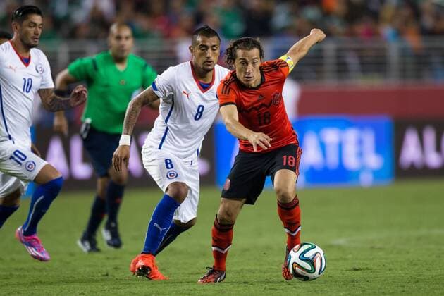 September 06, 2014: Mexico midfielder Andres Guardado (18) and Chile midfielder Arturo Vidal (8) battle for possession, during the game between Mexico and Chile at Levi s Stadium in Santa Clara. The game ended in a 0-0 draw. SOCCER: SEP 06 Mexico v Chile Icon20140906040 EDITORIAL USE ONLY