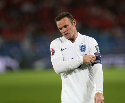England s Wayne Rooney holds his armband - Euro 2016 Qualifier Group E - Switzerland Vs England - St Jakob Park - Switzerland - 8th September 2014 - Picture David Klein Sportimage EDITORIAL USE ONLY. No use with unauthorised audio, video, data, fixture lists, club league logos or live services. Online in-match use limited to 120 images, no video emulation. No use in betting, games or single club league player publications.