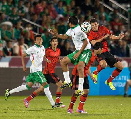 Sept. 9, 2014 - Commerce City, Colorado, U.S - Mexican National Team F JAVIER OROZCO, far right, goes up for a header with Bolivian National Team F CARLOS SAUCEDO, center, during the 1st. half at Dicks Sporting Goods Park Tuesday night . Mexico beats Bolivia 1-0 in an Int l Friendly match. Soccer 2014 - Mexico beats Bolivia 1-0 - ZUMAav4_