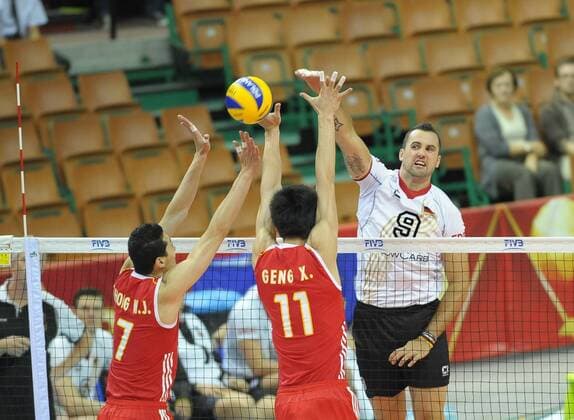 Siatkarzy 2014 FIVB Volleyball Men s World CHAMPIONSHIP 2014. Germany vs. China on September 10, 2014 in Katowice. In the picture: 9 Gyorgy Grozer 7 Weijun Zhong C 11 Xin Geng  EN_01143552_0849