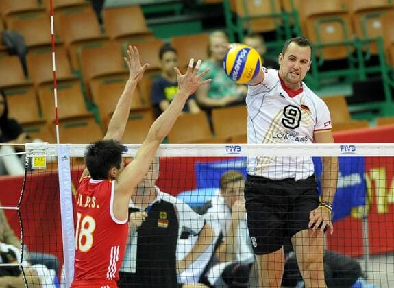 Siatkarzy 2014 FIVB Volleyball Men s World CHAMPIONSHIP 2014. Germany vs. China on September 10, 2014 in Katowice. In the picture: 9 Gyorgy Grozer 18 Daoshuai Ji  EN_01143552_0854