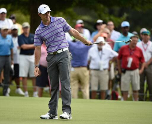 Rory McIlroy uses body english on a birdie attempt at No. 2 where he cards a par during the first round of the PGA Golf Herren Tour Championship on September 11, 2014 at East Lake Golf Club in Atlanta. The sport s top players are competing for a chance to win the FedExCup and a $10 million bonus.  AJP2014091119