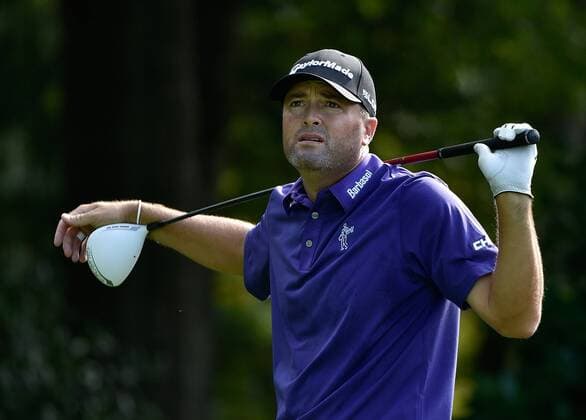 Ryan Palmer rests his arms on his driver at No. 3 during the second round of the PGA Golf Herren Tour Championship on September 12, 2014, at East Lake Golf Club in Atlanta.  AJP2014091209