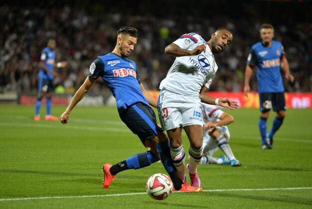 Nabil Dirar (mon) - Alexandre Lacazette (lyo) FOOTBALL : Olympique Lyon vs AS Monaco - Ligue 1 - 12 09 2014 AnthonyBIBARDFEP 