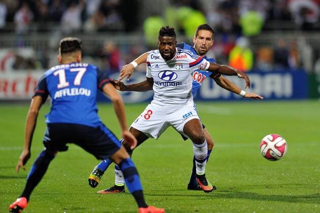 Arnold Mvuemba (lyon) vs Moutinho (monaco) FOOTBALL : Olympique Lyon vs AS Monaco - Ligue 1 - 12 09 2014 FredericChambert 
