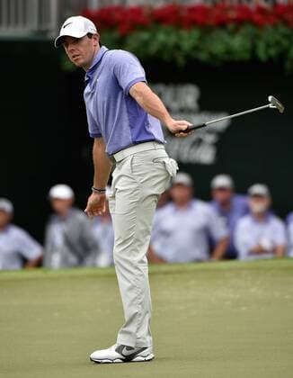 Rory McIlroy of Northern Ireland urges his birdie putt to fall on No. 18, during the final round of the PGA Golf Herren Tour Championship at East Lake Golf Club on September 14, 2014, in Atlanta.  AJP2014091428