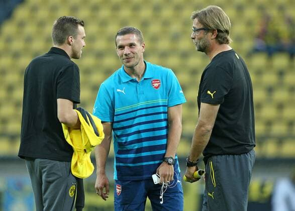 16.09.2014, Fussball Championsleague 2014 2015, Vorrunde, 1.Spieltag, Borussia Dortmund - Arsenal London, im Signal-Iduna-Park-Stadion Dortmund. v.l. Kevin Großkreutz (Dortmund) , Lukas Podolski (FC Arsenal) und Trainer Jürgen Klopp (Dortmund) 