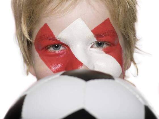 Boy (10-12), Austrian football fan, holding football, close-up model released  LMF00483