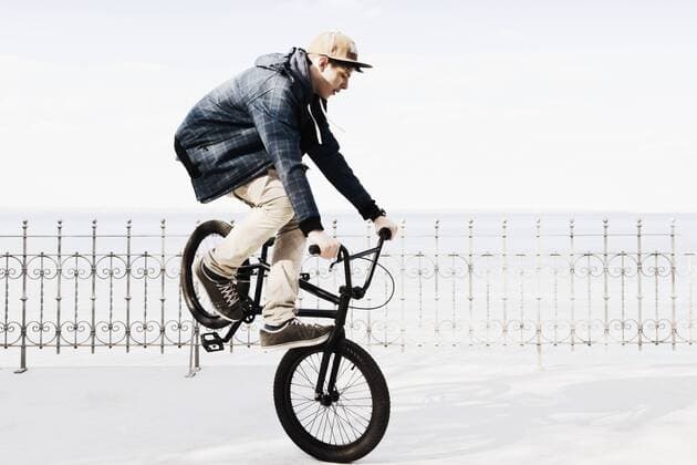 Germany, Schleswig Holstein, Teenage boy jumping with BMX bike model released  MSF002941