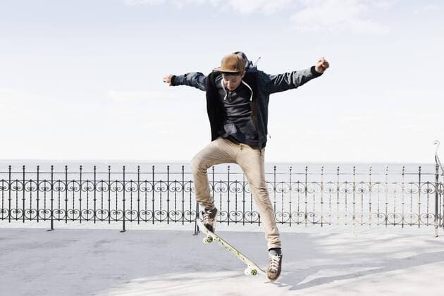 Germany, Schleswig Holstein, Teenage boy jumping with skateboard model released  MSF002943