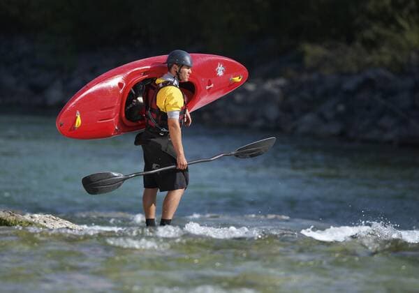 Germany, Man carrying canoe model released  WBF001393
