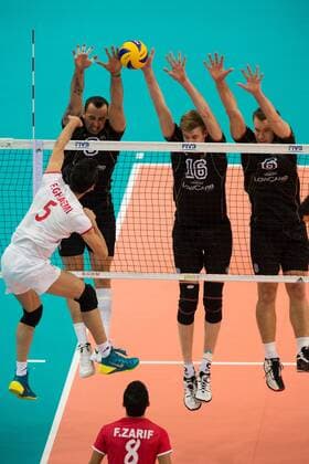 17.09.2014, Spodek, Kattowitz Volleyball, FIVB Volleyball Men s World Championship 2014, 3. Runde, Deutschland (GER) vs. Iran (IRI) Angriff Farhad Ghaemi ( 5 IRI) - Block Dreierblock Georg György Grozer ( 9 GER), Max Günthör ( 16 GER), Denis Kaliberda ( 6 GER)