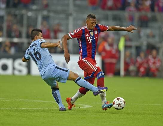 17.09.2014, Fussball Champions-League 2014 2015, Vorrunde 1.Spieltag, FC Bayern München - Manchester City, in der Allianz-Arena München. v.l. Kun Agüero (Manchester City) gegen Jerome Boateng (Bayern) 