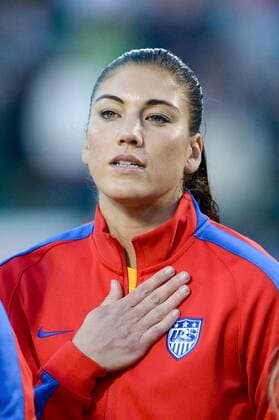 Sept. 18, 2014 - Rochester, New York, U.S - US goalie HOPE SOLO listens to the National Anthem before the game against Mexico at Sahlen s Stadium in Rochester, NY. The U.S. Women defeated Mexico 4-0. Soccer - U.S. Women defeat Mexico 4-0 - ZUMAj300