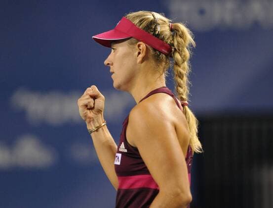 (140919) -- TOKYO, Sept. 19, 2014 -- Angelique Kerber of Germany reacts after scoring a point during the third round match at the Toray Pan Pacific Open tournament in Tokyo, Japan, Sept. 19, 2014. 