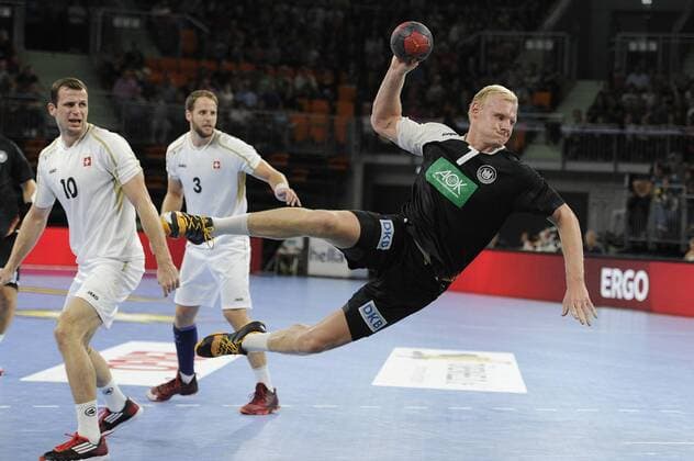 Patrick WIENCEK (GER),,Aktion,Sprungwurf,Tor. Handball Laenderspiel( Deutschland - Schweiz,am 21.09.2014 in Neu Ulm.