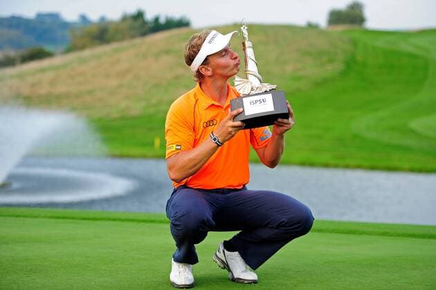 21.09.2014. Newport, Wales. ISPS Handa Wales Open Golf. Day 4. Joost Luiten wins and kisses the trophy xJonxBromleyx  ActionPlus11562531
