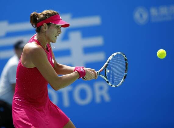 Garbine Muguruza of Spain returns a shot during the women s singles second round of the 2014 WTA Tennis Damen Wuhan Open tennis tournament in Wuhan city, central China s Hubei province, 23 September 2014.  20140923_45163