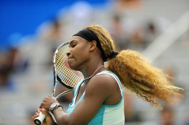 Serena Williams of the United States reacts during the Women s singles match at the WTA Tennis Damen Wuhan Open tennis tournament in Wuhan capital of central China s Hubei Province, on Sept. 23, 2014. ) (djj) (SP)CHINA-WUHAN-TENNIS-WUHAN OPEN-WILLIAMS HaoxTongqian 