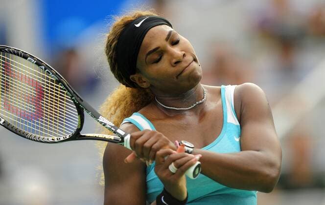 Serena Williams of the United States reacts during the Women s singles match at the WTA Tennis Damen Wuhan Open tennis tournament in Wuhan capital of central China s Hubei Province, on Sept. 23, 2014. ) (djj) (SP)CHINA-WUHAN-TENNIS-WUHAN OPEN-WILLIAMS HaoxTongqian 