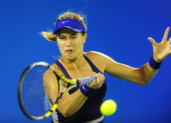 Canada s Eugenie Bouchard returns a shot during the Women s singles match at the WTA Tennis Damen Wuhan Open tennis tournament in Wuhan capital of central China s Hubei Province, on Sept. 23, 2014. ) (djj) (SP)CHINA-WUHAN-TENNIS-WUHAN OPEN-BOUCHARD HaoxTongqian 