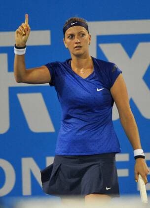 Petra Kvitova of Czech Republic gestures during the women s singles 2nd round match at the WTA Tennis Damen Wuhan Open tennis tournament in Wuhan, capital of central China s Hubei Province, on Sept. 23, 2014. ) (lm) (SP)CHINA-WUHAN-TENNIS-WTA-WUHAN OPEN XiaoxYijiu 