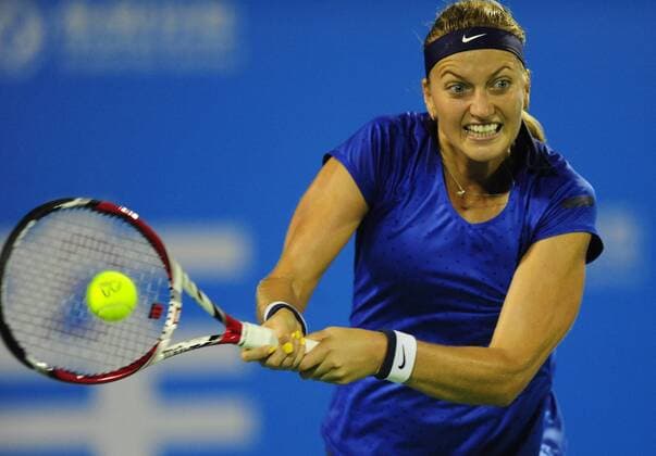 Petra Kvitova of Czech Republic returns a shot during the women s singles 2nd round match at the WTA Tennis Damen Wuhan Open tennis tournament in Wuhan, capital of central China s Hubei Province, on Sept. 23, 2014. ) (lm) (SP)CHINA-WUHAN-TENNIS-WTA-WUHAN OPEN HaoxTongqian 