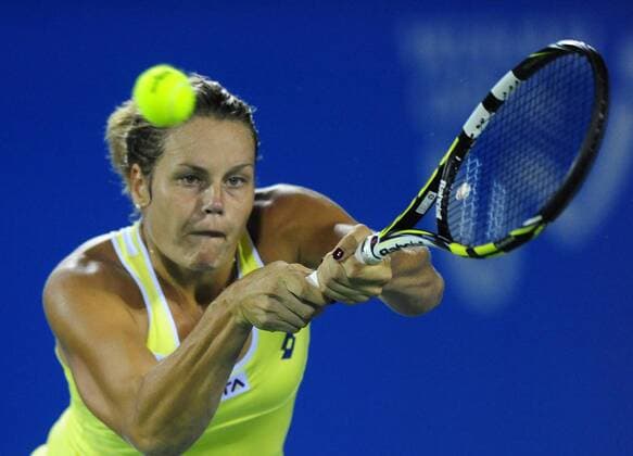 Karin Knapp of Italy returns a shot during the women s singles 2nd round match at the WTA Tennis Damen Wuhan Open tennis tournament in Wuhan, capital of central China s Hubei Province, on Sept. 23, 2014. ) (lm) (SP)CHINA-WUHAN-TENNIS-WTA-WUHAN OPEN HaoxTongqian 