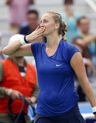 Petra Kvitova of the Czech Republic flies a kiss to the spectators during the women s singles quarter-finals of the 2014 WTA Tennis Damen Wuhan Open tennis tournament in Wuhan city, central China s Hubei province, 25 September 2014.  20140925_31037
