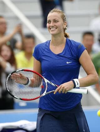 Petra Kvitova of the Czech Republic smiles during the women s singles quarter-finals of the 2014 WTA Tennis Damen Wuhan Open tennis tournament in Wuhan city, central China s Hubei province, 25 September 2014.  20140925_46806