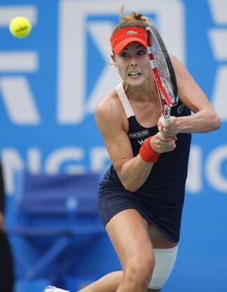 Alize Cornet of France prepares to return a shot during the women s singles quarter-finals of the 2014 WTA Tennis Damen Wuhan Open tennis tournament in Wuhan city, central China s Hubei province, 25 September 2014. 20140925_58424