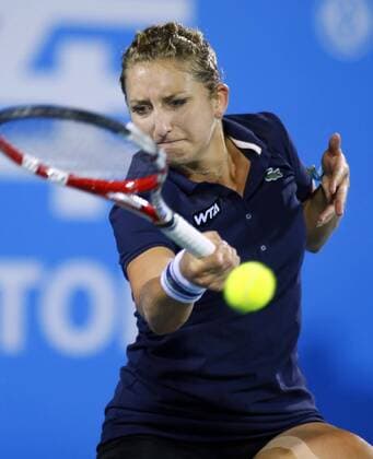 Timea Bacsinszky of Switzerland returns a shot during the women s singles quarter-final of the 2014 WTA Tennis Damen Wuhan Open tennis tournament in Wuhan city, central China s Hubei province, 25 September 2014.  20140925_60341