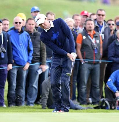 USA s Keegan Bradley hits out of the rough in the morning fourball match against Europe s Rory McIlroy ( Mc Ilroy ) and Sergio Garcia on the first day of the 2014 Ryder Cup in Gleneagles,Scotland on September 26, 2014. USA s Bradley and Keegan won the match.  LON2014092602