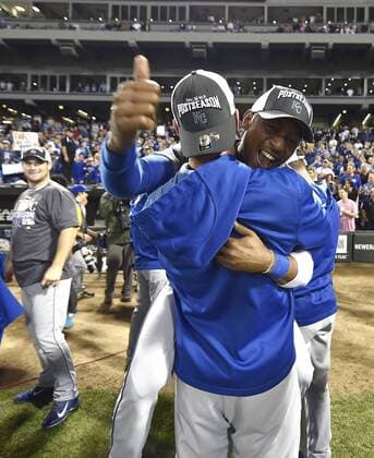 Sept. 26, 2014 - Chicago, IL, USA - The Kansas City Royals Jarrod Dyson Jarrod Dyson leaps into the arms of James Shields as the team clinches a wild card spot following a 3-1 win against the Chicago White Sox on Friday, Sept. 26, 2014, at U.S. Cellular Field in Chicago. The postseason berth is the Royals first in 29 years. Kansas City at Chicago White Sox - ZUMAm67_
