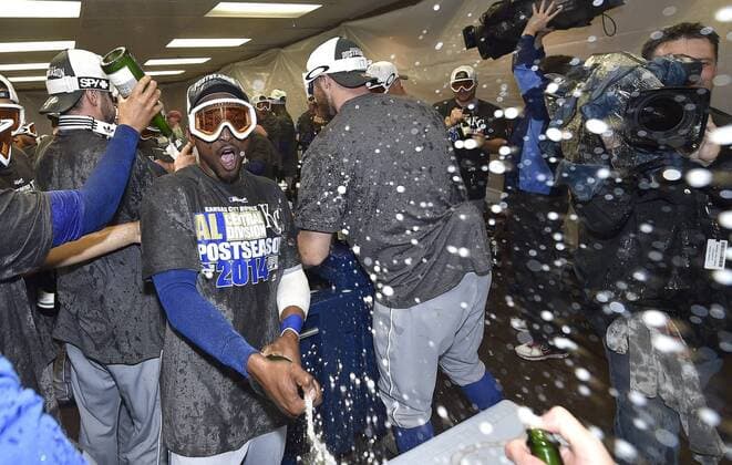 Sept. 26, 2014 - Chicago, IL, USA - The Kansas City Royals Jarrod Dyson celebrates of the team clinches a wild card spot following a 3-1 win against the Chicago White Sox on Friday, Sept. 26, 2014, at U.S. Cellular Field in Chicago. The postseason berth is the Royals first in 29 years. Kansas City at Chicago White Sox - ZUMAm67_