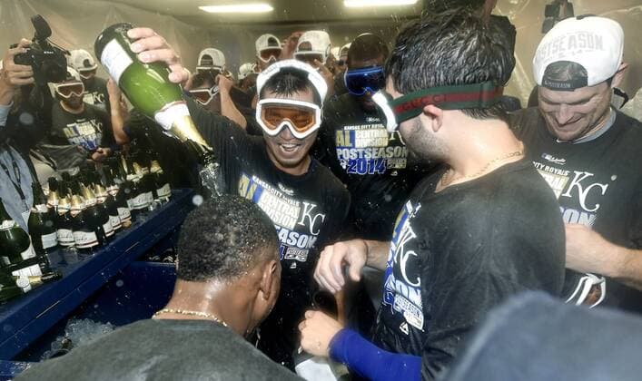 Sept. 26, 2014 - Chicago, IL, USA - The Kansas City Royals Norichika Aoki amid the celebration after the team clinches a wild card spot following a 3-1 win against the Chicago White Sox on Friday, Sept. 26, 2014, at U.S. Cellular Field in Chicago. The postseason berth is the Royals first in 29 years. Kansas City at Chicago White Sox - ZUMAm67_