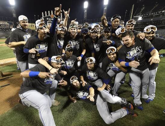 Sept. 26, 2014 - Chicago, IL, USA - The Kansas City Royals celebrate after the team clinches a wild card spot following a 3-1 win against the Chicago White Sox on Friday, Sept. 26, 2014, at U.S. Cellular Field in Chicago. The postseason berth is the Royals first in 29 years. Kansas City at Chicago White Sox - ZUMAm67_