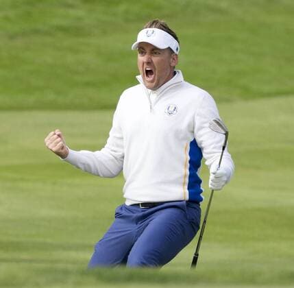 Europe s Ian Poulter celebrates a chip in the morning fourball match against USA s Rickie Fowler and Jimmy Walker on the second day of the 2014 Ryder Cup in Gleneagles,Scotland on September 27, 2014.The match was halved.  LON2014092732