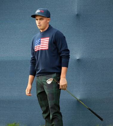 USA s Rickie Fowler reacts in the afternoon foursomes match against Europe s Victor Dubuisson and Graeme McDowell on the second day of the 2014 Ryder Cup in Gleneagles,Scotland on September 27, 2014.  LON2014092753