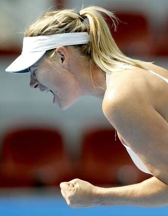 Maria Sharapova of Russia celebrates a score during the women s 2nd round match at the 2014 China Open in Beijing, capital of China, on Sept. 30, 2014. ChenxJianli 