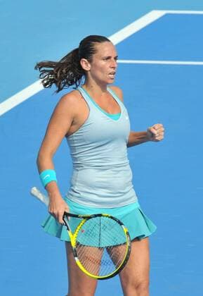 Roberta Vinci of Italy reacts during the women s 2nd round match at the 2014 China Open in Beijing, capital of China, on Sept. 30, 2014. LixWen 