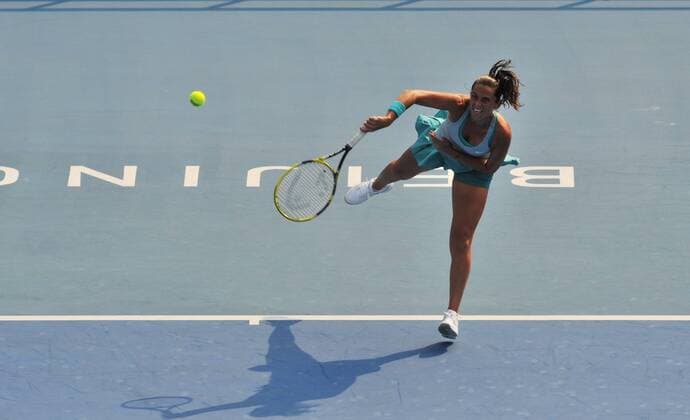 Roberta Vinci of Italy competes during the women s 2nd round match at the 2014 China Open in Beijing, capital of China, on Sept. 30, 2014. LixWen 