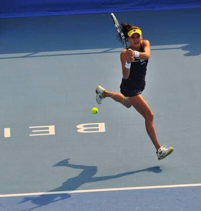 Agnieszka Radwanska of Poland returns a hit during the women s 2nd round match at the 2014 China Open in Beijing, capital of China, on Sept. 30, 2014. LixWen 