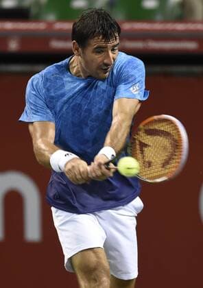 (141001) -- TOKYO, Oct. 1, 2014 -- Ivan Dodig of Croatia hits a return during the first round match at the Rakuten Japan Open Tennis Championships 2014 in Tokyo, Japan, Oct. 1, 2014. 