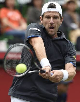 (141002) -- TOKYO, Oct. 2, 2014 -- Jurgen Melzer of Austria hits a return during the second round match at the Rakuten Japan Open Tennis Championships 2014 in Tokyo, Japan, Oct. 2, 2014. 