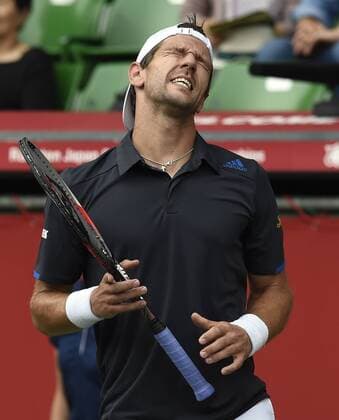 (141002) -- TOKYO, Oct. 2, 2014 -- Jurgen Melzer of Austria reacts after losing a point during the second round match at the Rakuten Japan Open Tennis Championships 2014 in Tokyo, Japan, Oct. 2, 2014. 