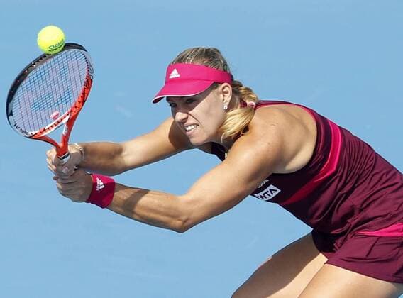 (141002) -- BEIJING, Oct. 2, 2014 -- Germany s Angelique Kerber returns a hit during the women s third round match at the 2014 China Open in Beijing, capital of China, on Oct. 2, 2014. ChenxJianli 