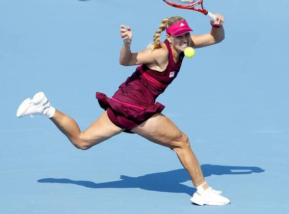 (141002) -- BEIJING, Oct. 2, 2014 -- Germany s Angelique Kerber returns a hit during the women s third round match at the 2014 China Open in Beijing, capital of China, on Oct. 2, 2014. ChenxJianli 