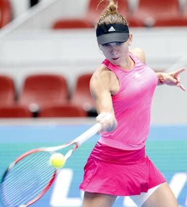 (141002) -- BEIJING, Oct. 2, 2014 -- Romania s Simona Halep returns a hit during the women s third round match at the 2014 China Open in Beijing, capital of China, on Oct. 2, 2014. ChenxJianli 