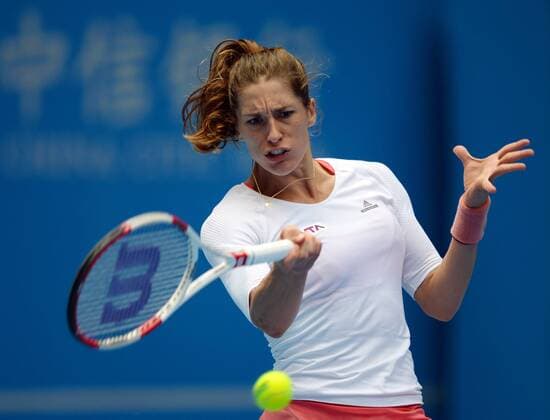 (141002) -- BEIJING, Oct. 2, 2014 -- Germany s Andrea Petkovic returns a hit during the women s third round match at the 2014 China Open in Beijing, capital of China, on Oct. 2, 2014. ChenxYehua 
